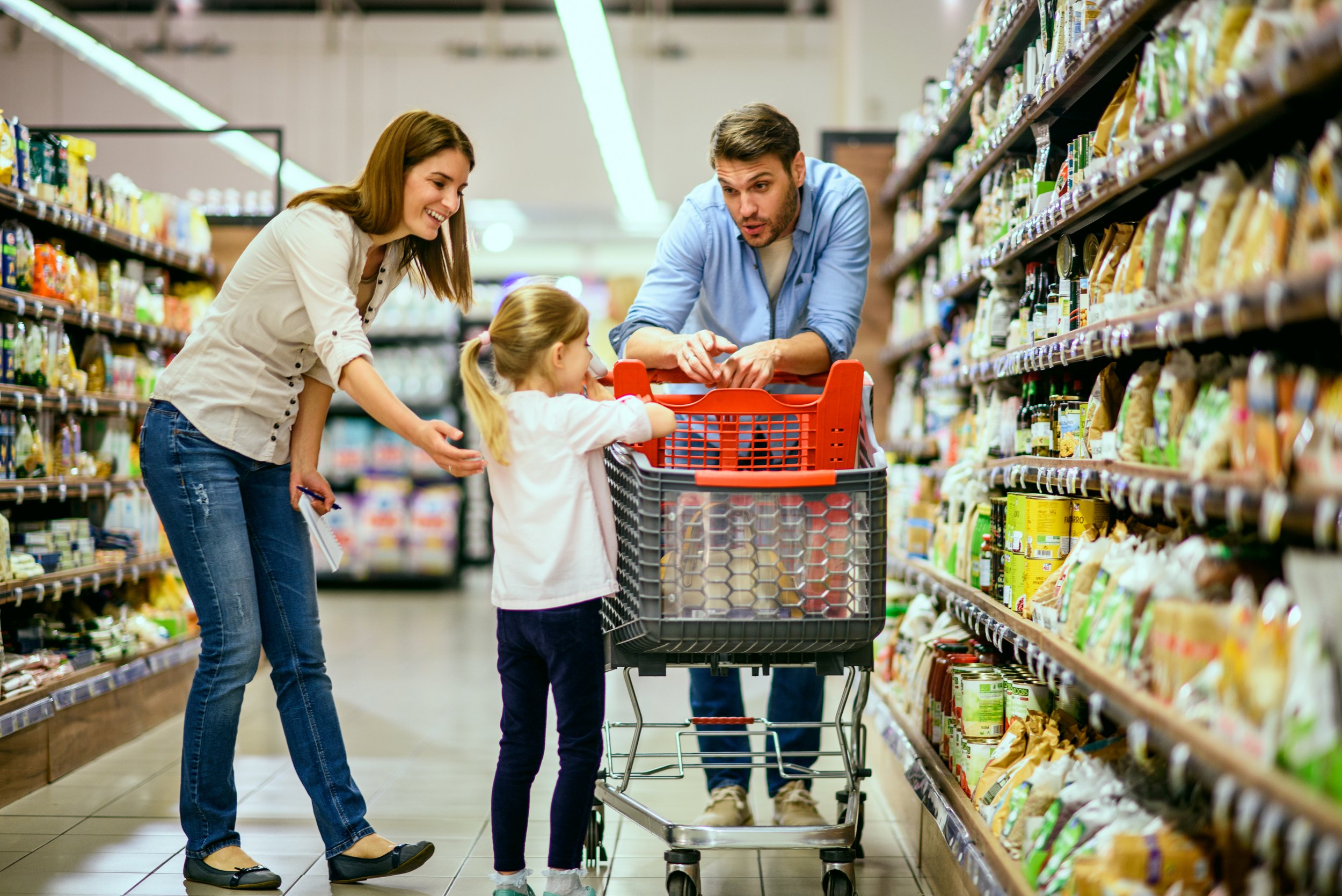 Family shopping in grocery store